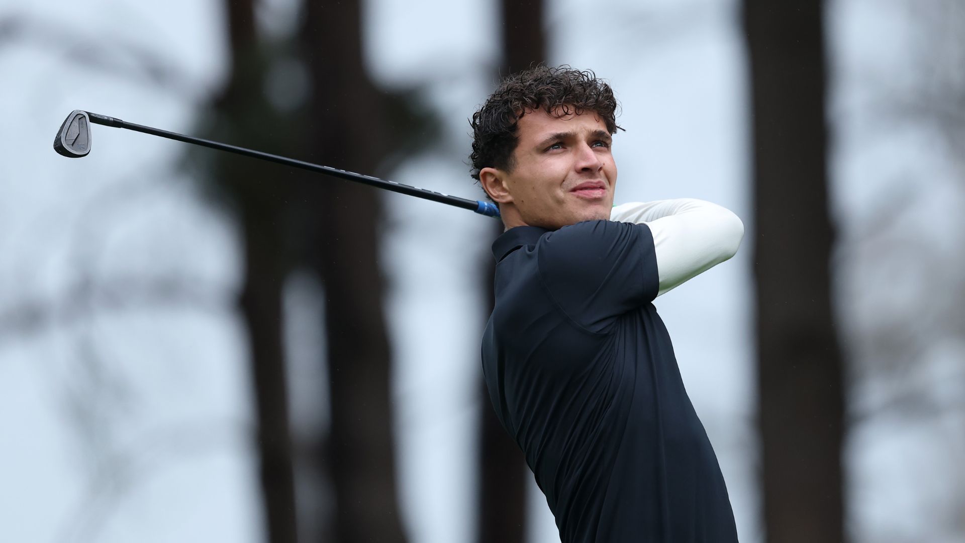 Lando Norris celebrates F1 title with golf in the off-season